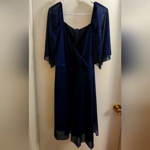 Navy sparkling dress.